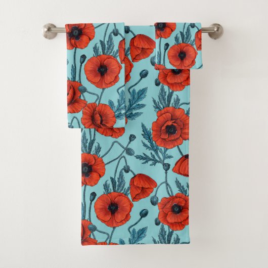 Papavers, rood en blauw op zwembad blauw bad handdoek (Insitu)