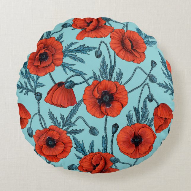 Papavers, rood en blauw op zwembad blauw rond kussen (Voorkant)