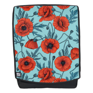 Papavers, rood en blauw op zwembad blauw rugtassen