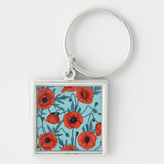 Papavers, rood en blauw op zwembad blauw sleutelhanger (Voorkant)