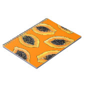 Papaya plakjes op sinaasappel notitieboek (Linkerzijde)