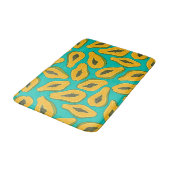 Papaya snijwonden op turquoise badmat (Gekanteld)