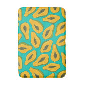 Papaya snijwonden op turquoise badmat (Voorkant Verticaal)