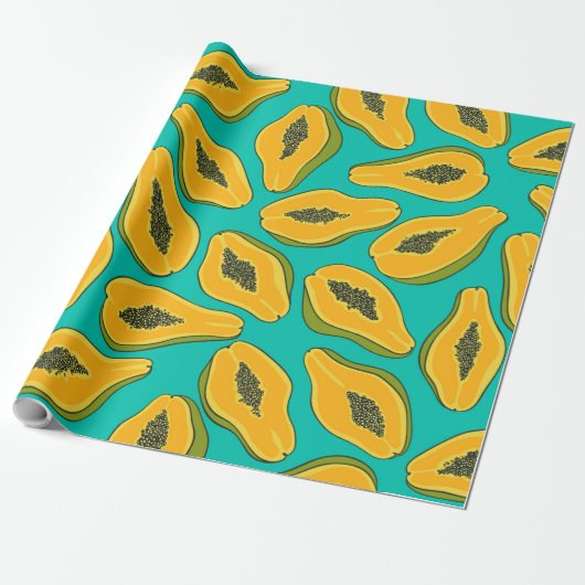 Papaya snijwonden op turquoise cadeaupapier (Uitgerold)