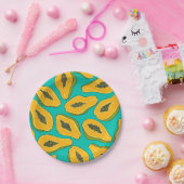 Papaya snijwonden op turquoise papieren bordje (Feest)