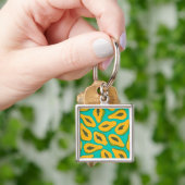 Papaya snijwonden op turquoise sleutelhanger (Hand)
