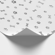 Papel de regalo con patas de perro