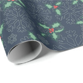 Papel navideño con copos de nieve y acebo cadeaupapier (Rol Hoek)