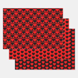 Papieren bladen met rode en zwarte harten inpakpapier vel