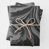 Papieren bladen met zwarte en grijze inkt inpakpapier vel (In situ)