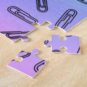 Papieren clips boven regenboog legpuzzel (Zijkant)
