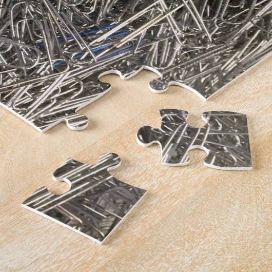 Papieren clips in een stapel puzzel legpuzzel (Zijkant)