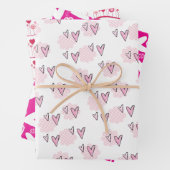 Papieren vellen Valentijns roze rode harten (In situ)