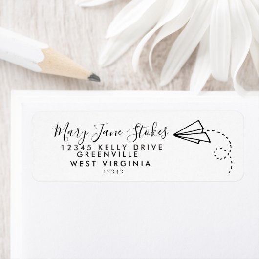 Papieren vliegtuig omlooprichting papieren vliegtu etiket (Insitu)