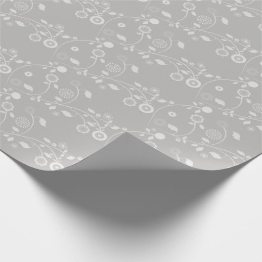 Papieren zilver en witte flora omsluiten cadeaupapier (Hoek)