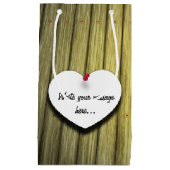 Papierhandgeschreven script, bijtend klein cadeauzakje (Voorkant)