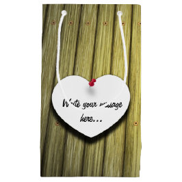 Papierhandgeschreven script, bijtend klein cadeauzakje