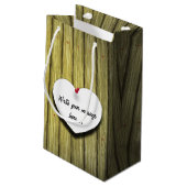 Papierhandgeschreven script, bijtend klein cadeauzakje (Achterkant Gekanteld)