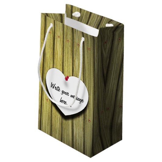 Papierhandgeschreven script, bijtend klein cadeauzakje (Achterkant Gekanteld)