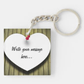 Papierhandgeschreven script, bijtend sleutelhanger (Achterkant)