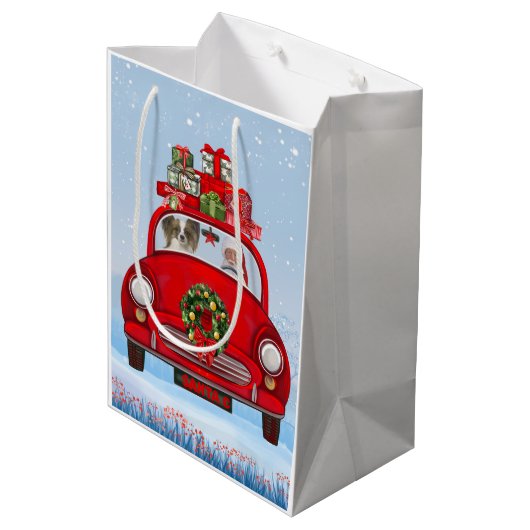 Papillon Dog in auto met kerstman Medium Cadeauzakje (Achterkant Gekanteld)