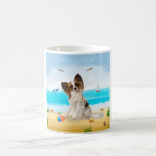 Papillon Dog op strand Koffiemok