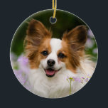 Papillon Dog Romantic Cute Portrait Keramisch Ornament<br><div class="desc">Een Witte en Rode Papillon hond die in een weide zit omringd door Cuckooflower. Papillon is een waarschuwend,  vriendelijk en zeer slim speelgoed ras. Deze mooie bril werd gefotografeerd door Katho Menden,  deze keramische kerstsieraad is een betoverend speciaal cadeauidee voor doglovers.</div>