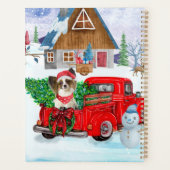 Papillon-hond in kerstbezorgingswagen sneeuw planner (Achterkant)