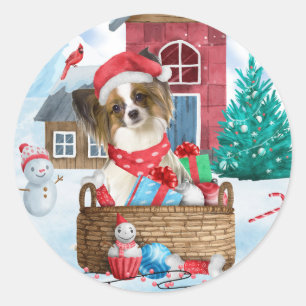 Papillon-hond in sneeuw Kerstmis Hondenhok  Ronde Sticker