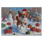 Papillon hond loopt in de sneeuw met kerst Pet Snijplank (Voorkant)