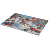 Papillon hond loopt in de sneeuw met kerst Pet Snijplank (Hoek)