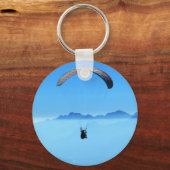 Paraglider op blauwe achtergrond met bergen sleutelhanger (Voorkant)