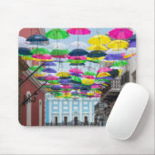 Paraplu's boven San Juan Streets en Mansion Muismat (Met muis)