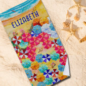 Paraplu's in de zand strandlaken