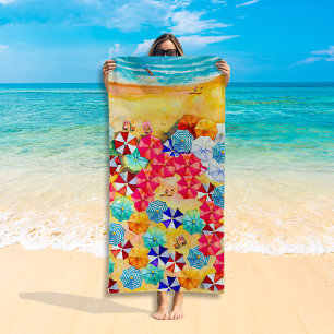 Paraplu's in de zand strandlaken