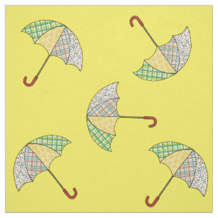 Paraplu's op gele stof