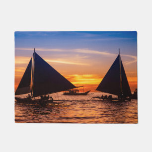 Paraw Sailing op zonsondergang Phillipines Deurmat