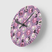 Parels en juwelen in roze ronde klok (Hoek)