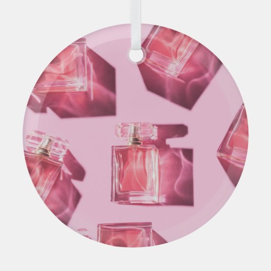 Parfumflessen, roze achtergrond, flatlay glas ornament (Voorkant)
