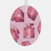 Parfumflessen, roze achtergrond, flatlay glas ornament (Voorkant Rechts)