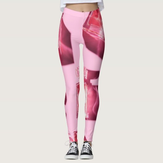 Parfumflessen, roze achtergrond, flatlay leggings (Voorkant)