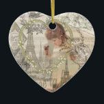 Parijs Collage Keramisch Ornament<br><div class="desc">Een collage in Parijs is gemaakt van antiek papierresten van alle Fransen. Het franse ontwerp omvat de Eiffeltoren, een klein Frans meisje met vlinders, veel Franse letters en muziek, en een wereldbol, perfect voor een wereldspeler die van alles Frans houdt. Parijs is inderdaad een mooie stad - vol bloemen, antieke...</div>