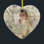 Parijs Collage Keramisch Ornament<br><div class="desc">Een collage in Parijs is gemaakt van antiek papierresten van alle Fransen. Het franse ontwerp omvat de Eiffeltoren, een klein Frans meisje met vlinders, veel Franse letters en muziek, en een wereldbol, perfect voor een wereldspeler die van alles Frans houdt. Parijs is inderdaad een mooie stad - vol bloemen, antieke...</div>