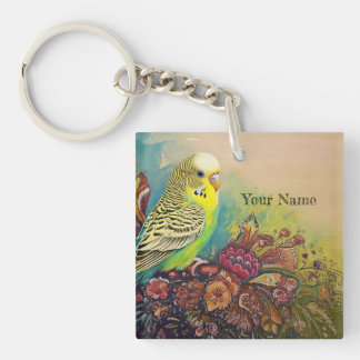 Parkiet met volkskunstbloemen sleutelhanger
