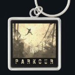 Parkour Urban Obstacle Course Modern Sepia Sleutelhanger<br><div class="desc">Een moderne kunstenaar heeft de indruk dat parkour wordt geoefend in een stadsachterstraat in sepia tones.</div>