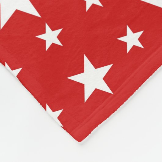Partij sterren op rood fleece deken (Hoek)