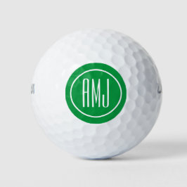 Pas groen en wit monogram aan golfballen