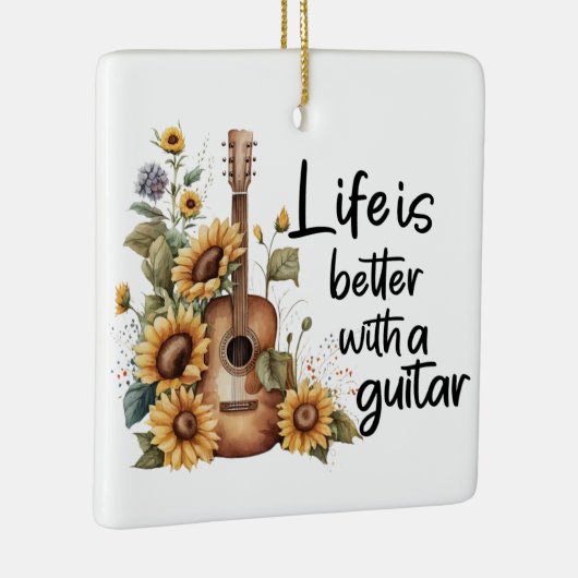 Pas naamgitaar met zonnebloem aan keramisch ornament (Rechts)