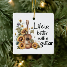 Pas naamgitaar met zonnebloem aan keramisch ornament