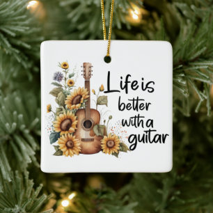 Pas naamgitaar met zonnebloem aan keramisch ornament